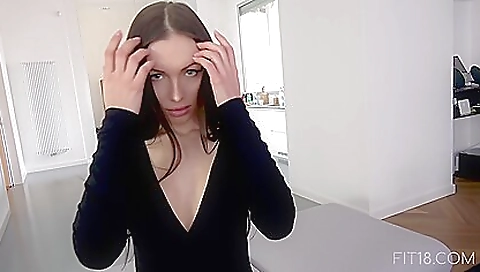 Sexy brunette in stockings shows her sexy body in cast