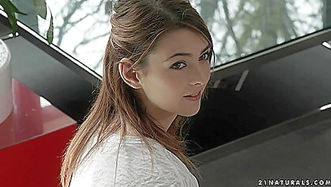 Busty brunette with a tattooed face enjoys cunnilingus