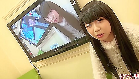 Hot asian brunette with large natural tits gives a blowjob