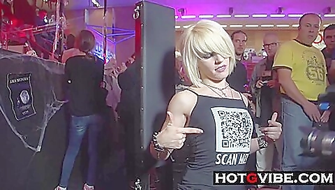 Blonde spanieler has fun with a group of men in public