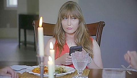 Beautiful red-haired MILF showing off her perfect ass and tits