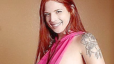 Redheaded redhead is showing her huge tits and big cock