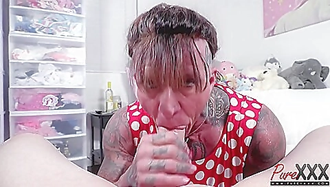 Tattooed girl is giving a deepthroat blowjob in the shower